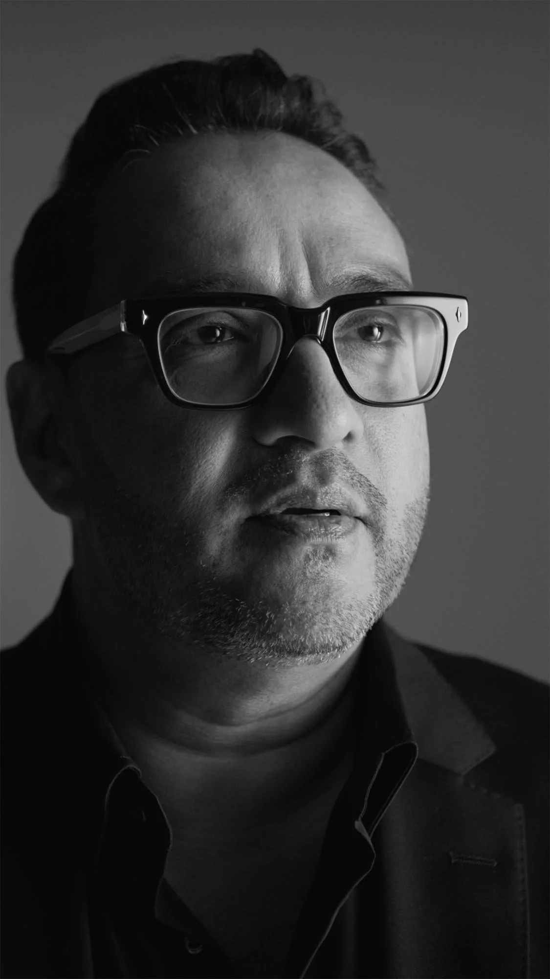 High-contrast cinematic black and white CEO interview in Dubai